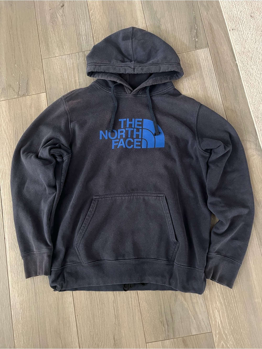 The North Face Black Pullover Hoodie with Blue Logo